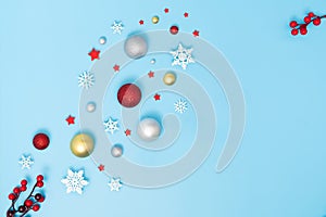 Christmas object composition, decoration or ornament for holiday and new year with snowflakes on blue background