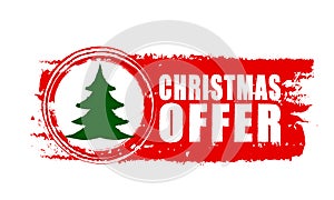 Christmas offer and christmas tree on red drawn banner photo