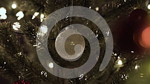 Christmas ornament hang the christmas tree with bokeh lights