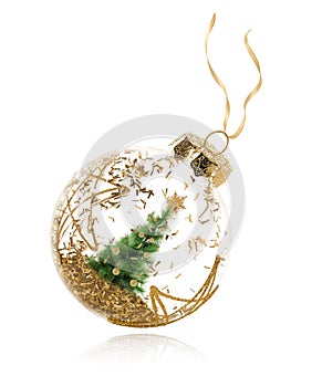 Christmas ornament with tree and golden glitters isolated. Clipping path