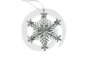 Christmas ornamental silver snowflakes isolated on white background.