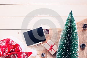 Christmas ornaments and gift box on wooden background, Flat lay