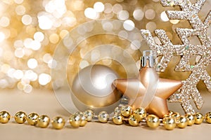Christmas ornaments with gold circle bokeh light sparkle background