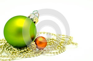 Christmas ornaments - green and orange ball with golden pearls