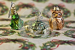 Christmas Ornaments on holiday wrapping paper