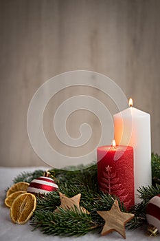 Christmas ornaments with snow, pine tree and candle