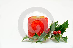 Christmas ornaments - red candle and green holly