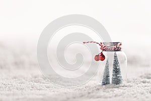 Christmas ornaments on snow