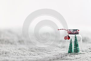 Christmas ornaments on snow