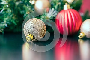 Christmas ornaments on the table waiting to be hung