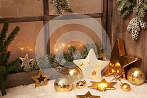 Christmas ornaments on window sill - country style decoration for a greeting card