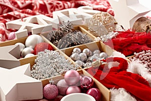 Christmas ornaments in wooden compartment