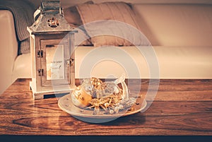 Christmas ornaments on wooden table in cosy home