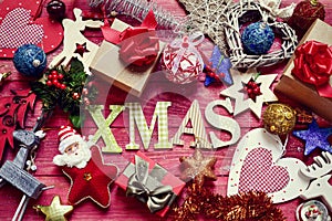 Christmas ornaments and word xmas