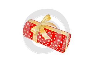 Christmas or other holiday handmade present in red paper with Gold ribbon. Isolated on white background, top view. thanksgiving