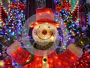 Christmas outdoor Christmas decorations - Snowman lights up house in Brooklyn, New York