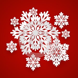 Christmas paper snowflakes on red background for Your winter holiday design
