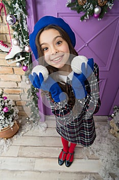 Christmas party. Cheerful girl having fun christmas eve. Child believe in miracle. Girl little kid hold decorations