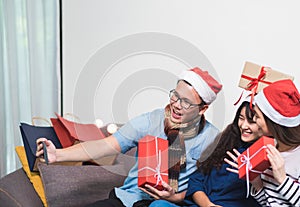 Christmas party with friends, asia woman selfie with smiling face with friends,Holiday celebration concept.