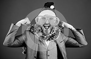 Christmas party organisers. Guy tinsel ready celebrate new year. Corporate party ideas employees will love. Corporate
