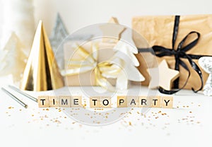 Christmas party time - confetti, gifts, tree, stars, glitter, ribbon. Party time lettering. New year 2023-2024.