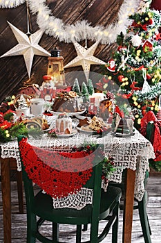 Christmas pastries on festive table in rustic style