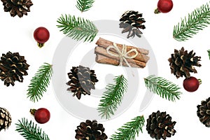 Christmas pattern fir brunches and pine cones on the white background