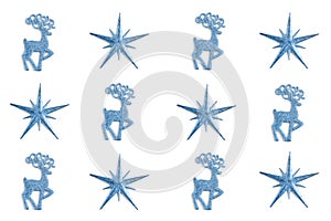 Christmas pattern made of stars and deer toys blue color on white background. winter concept, flat lay, top view