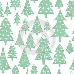Christmas pattern - varied Xmas trees and snowflakes. photo
