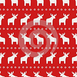 Christmas pattern - Xmas reindeer and star on red background.