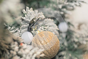 Christmas photo with holiday decorations, fir branches and festive bokeh lighting