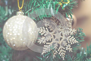 Christmas photo with holiday decorations, fir branches and festive bokeh lighting