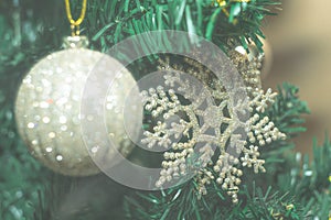 Christmas photo with holiday decorations, fir branches and festive bokeh lighting