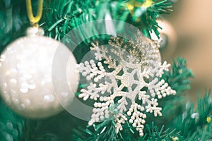 Christmas photo with holiday decorations, fir branches and festive bokeh lighting