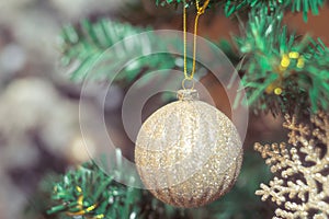 Christmas photo with holiday decorations, fir branches and festive bokeh lighting