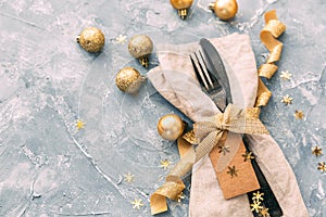 Christmas place setting with golden ribbon