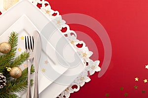 Christmas place setting with ribbon and christmas decorations