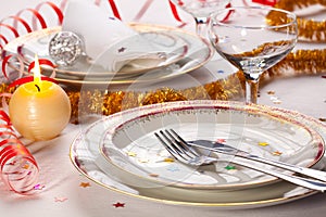 Christmas place setting with ribbon and New Year decorations