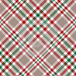 Christmas plaid pattern in red, green, white. Seamless textured glen hounds tooth check plaid for tablecloth, skirt.