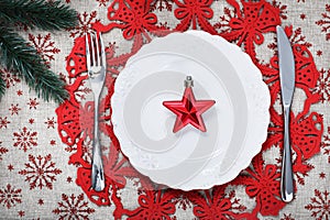 Christmas plate on holiday background with red star