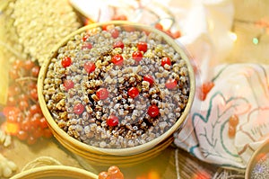 Christmas porridge kutya over wooden background. Traditional Ukrainian food