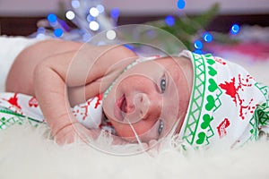 Christmas portrait of cute little newborn baby boy