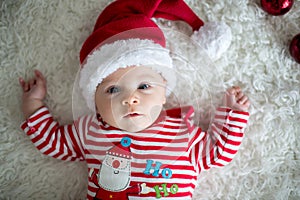 Christmas portrait of cute little newborn baby boy