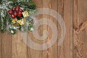 Christmas postcard with brown wooden background