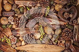 Christmas potpourri background. Traditional decoration of pinecones nuts and berries