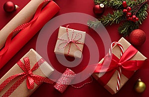 Christmas preparation, boxing day and holidays gift giving, xmas craft paper and ribbons for gifts boxes on red