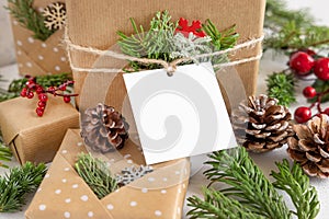 Christmas present with square blank gift tag close up, Mockup
