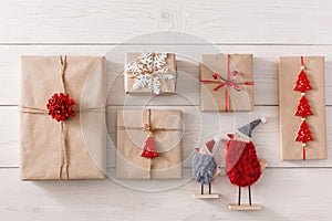 Christmas presents background on white wood