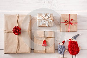 Christmas presents background on white wood