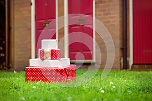 Christmas presents delivered to house front door in summer